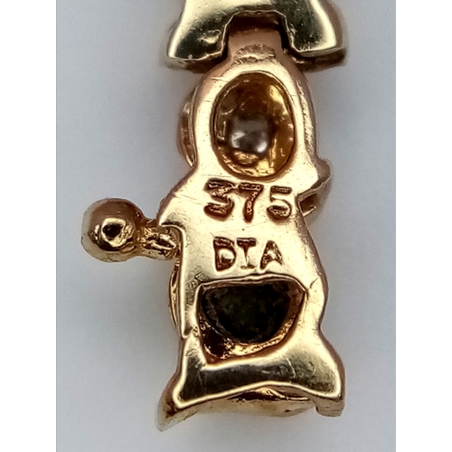 230 - A 9K YELLOW GOLD, DIAMOND AND EMERALD BRACELET. 6.6G. WITH SAFETY CATCH FITTING. 17CM. SC7021.