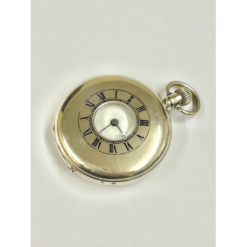 213 - A GENTS SILVER HALF HUNTER POCKET WATCH. IN WORKING ORDER  . REF: LU15/16.