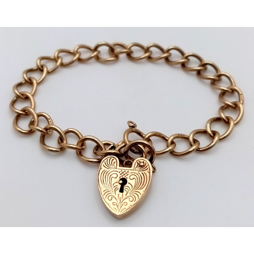 205 - A 9k yellow gold curb bracelet. 13.6g. 16cm total length. SH1911I.