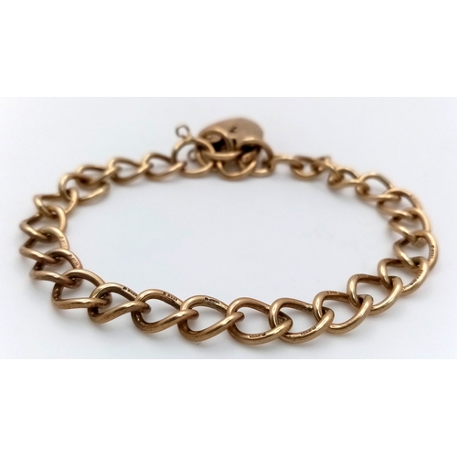 205 - A 9k yellow gold curb bracelet. 13.6g. 16cm total length. SH1911I.