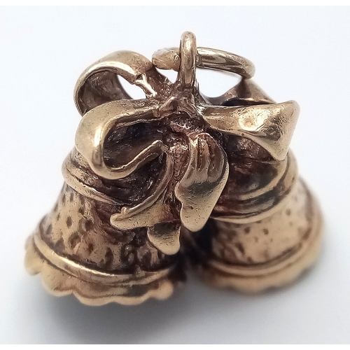 218 - A 9k yellow gold bells charm. 4.1g total weight. SH1922I.