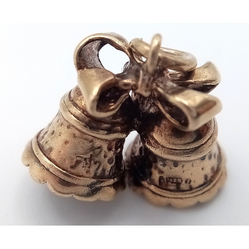 218 - A 9k yellow gold bells charm. 4.1g total weight. SH1922I.