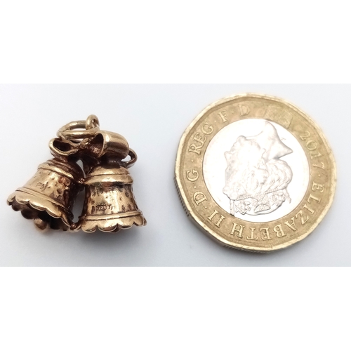 218 - A 9k yellow gold bells charm. 4.1g total weight. SH1922I.
