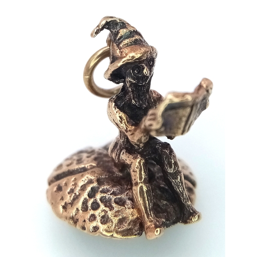 239 - A 9k yellow gold gnome on mushroom charm. 2.7g total weight. SH1921I.