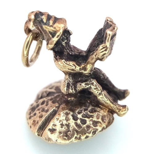 239 - A 9k yellow gold gnome on mushroom charm. 2.7g total weight. SH1921I.