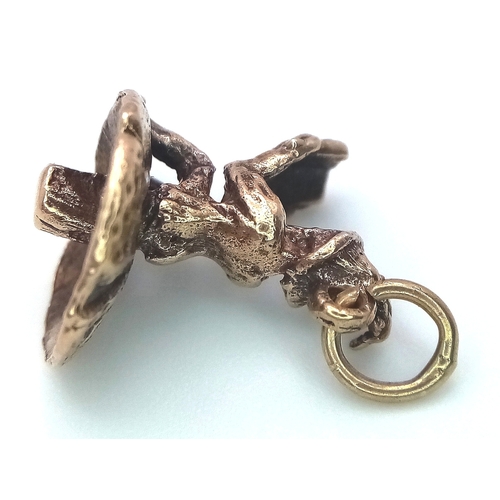 239 - A 9k yellow gold gnome on mushroom charm. 2.7g total weight. SH1921I.