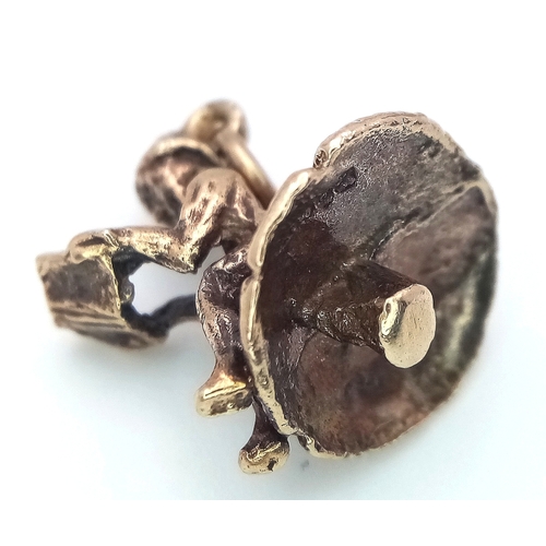 239 - A 9k yellow gold gnome on mushroom charm. 2.7g total weight. SH1921I.