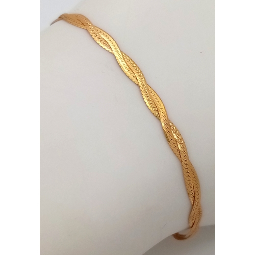 196 - Dainty and Elegant 9 CARAT GOLD WOVEN FLAT LINK BRACELET.1.25 grams. 18 cm.