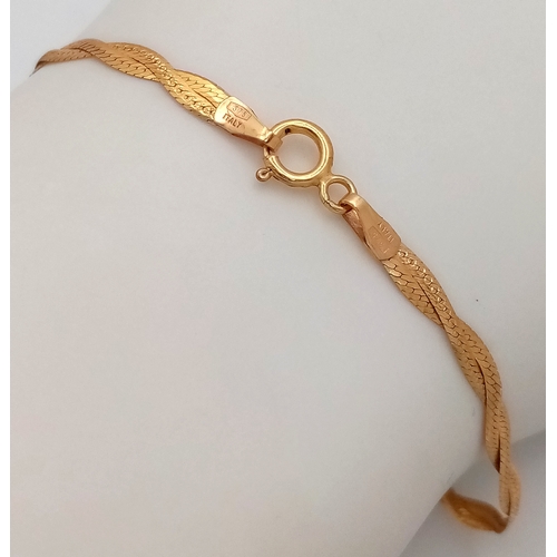196 - Dainty and Elegant 9 CARAT GOLD WOVEN FLAT LINK BRACELET.1.25 grams. 18 cm.