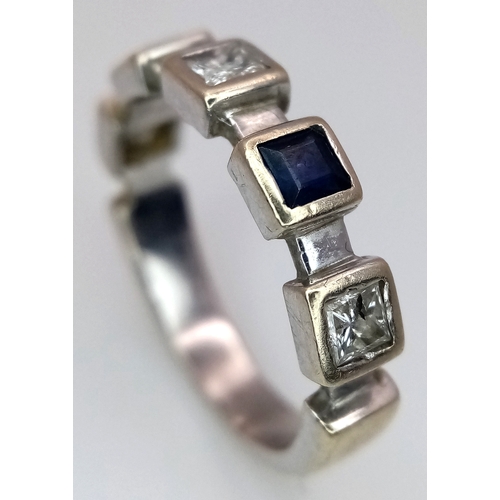 203 - A Beautiful modern Interpretation of a HALF ETERNITY RING. Consisting DIAMONDS and SPINEL GEMSTONES,... 