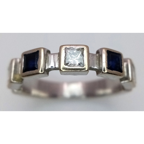 203 - A Beautiful modern Interpretation of a HALF ETERNITY RING. Consisting DIAMONDS and SPINEL GEMSTONES,... 