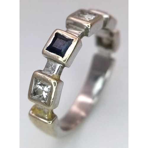 203 - A Beautiful modern Interpretation of a HALF ETERNITY RING. Consisting DIAMONDS and SPINEL GEMSTONES,... 