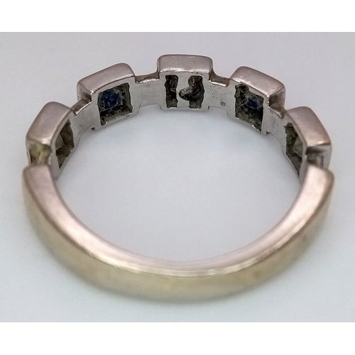 203 - A Beautiful modern Interpretation of a HALF ETERNITY RING. Consisting DIAMONDS and SPINEL GEMSTONES,... 