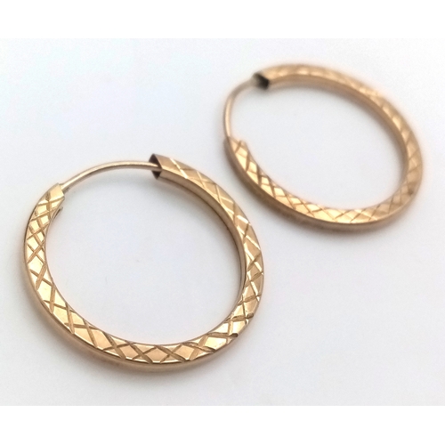 224 - Traditional pair of 9 CARAT GOLD HOOP EARRINGS. Diamond cut pattern. 0.63 grams. 1.75 cm Diameter. p... 
