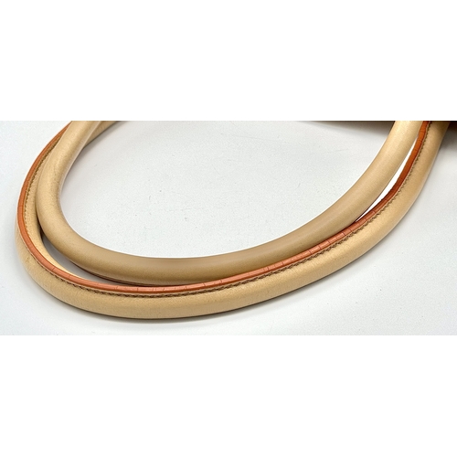 201 - A Prada Beige and Orange Leather Tote Bag. Beige leather exterior with gold-toned hardware, dual rol... 