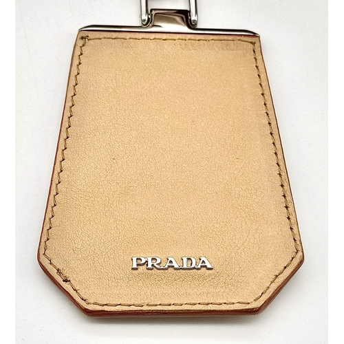 201 - A Prada Beige and Orange Leather Tote Bag. Beige leather exterior with gold-toned hardware, dual rol... 
