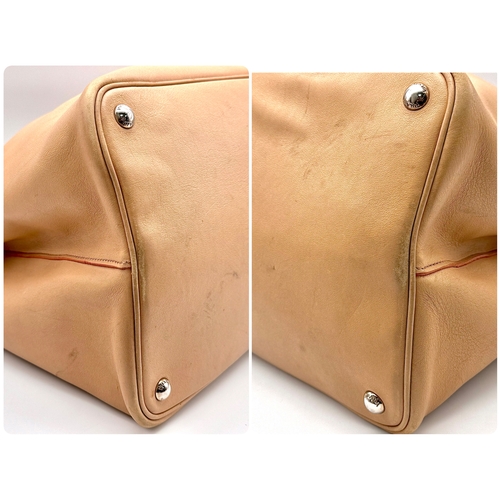 201 - A Prada Beige and Orange Leather Tote Bag. Beige leather exterior with gold-toned hardware, dual rol... 