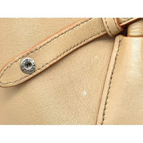 201 - A Prada Beige and Orange Leather Tote Bag. Beige leather exterior with gold-toned hardware, dual rol... 