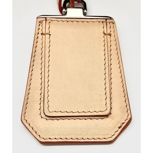 201 - A Prada Beige and Orange Leather Tote Bag. Beige leather exterior with gold-toned hardware, dual rol... 