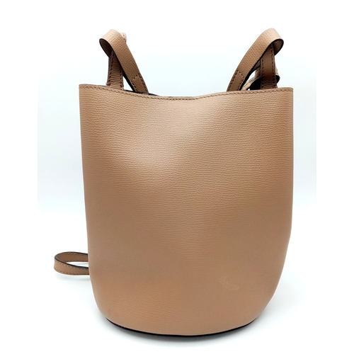 222 - A Burberry Brown Leather Bucket Bag. Brown leather exterior with gold-toned hardware and an adjustab... 