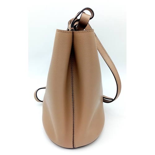 222 - A Burberry Brown Leather Bucket Bag. Brown leather exterior with gold-toned hardware and an adjustab... 