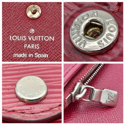 194 - A Louis Vuitton Epi Sarah Wallet. Purple Epi leather exterior with silver-toned hardware and a patch... 