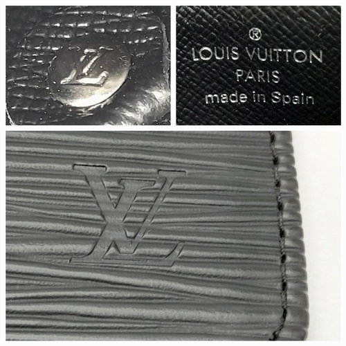 208 - A Louis Vuitton Black Coin Purse. Epi leather exterior with silver-toned hardware, clasp on chain an... 