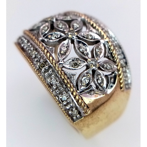 159 - A 9K YELLOW GOLD FLOWER DESIGN DIAMOND SET RING 5.8G SIZE N. REF: SC 9001