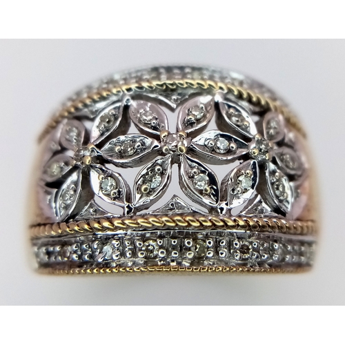 159 - A 9K YELLOW GOLD FLOWER DESIGN DIAMOND SET RING 5.8G SIZE N. REF: SC 9001