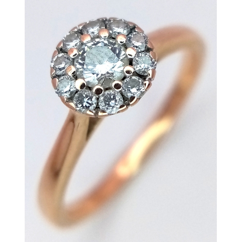 180 - AN 18K ROSE GOLD DIAMOND HALO RING 0.26CT 2.7G SIZE K. REF: SC 9088