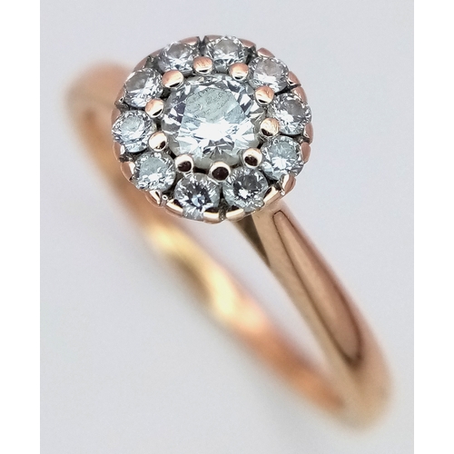 180 - AN 18K ROSE GOLD DIAMOND HALO RING 0.26CT 2.7G SIZE K. REF: SC 9088