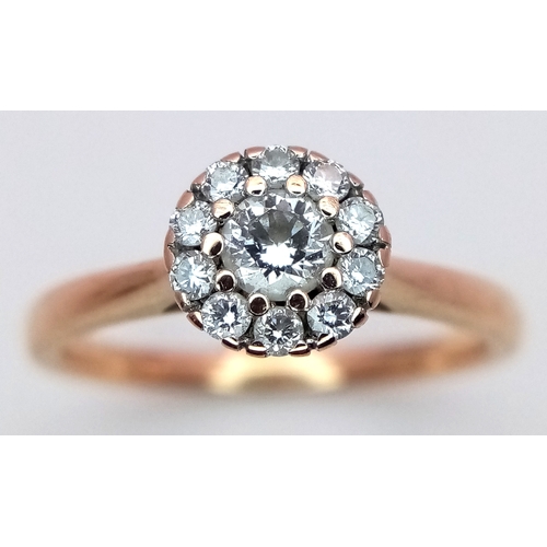 180 - AN 18K ROSE GOLD DIAMOND HALO RING 0.26CT 2.7G SIZE K. REF: SC 9088
