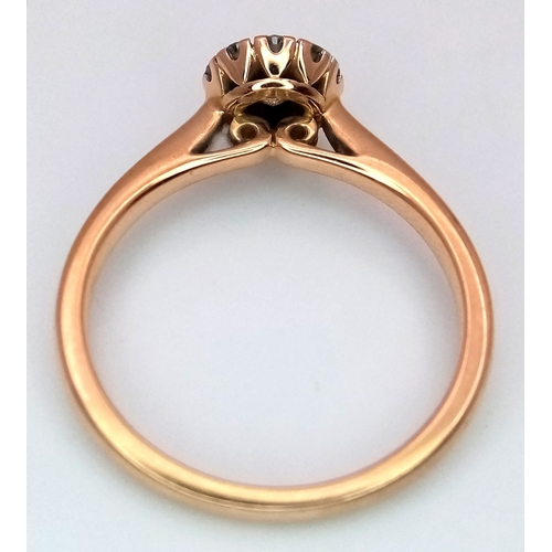 180 - AN 18K ROSE GOLD DIAMOND HALO RING 0.26CT 2.7G SIZE K. REF: SC 9088