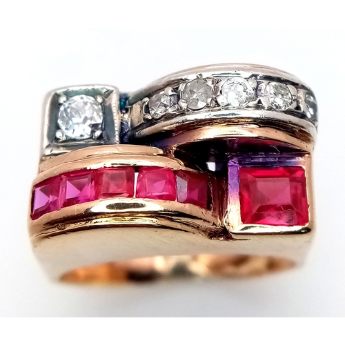 48 - An 18K Gold, Ruby and Diamond Ring. Princess and round cut stones in a mirrored form. 0.40ctw diamon... 