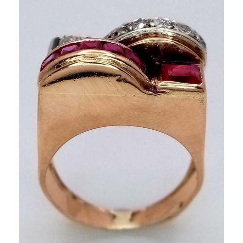48 - An 18K Gold, Ruby and Diamond Ring. Princess and round cut stones in a mirrored form. 0.40ctw diamon... 