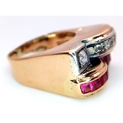48 - An 18K Gold, Ruby and Diamond Ring. Princess and round cut stones in a mirrored form. 0.40ctw diamon... 