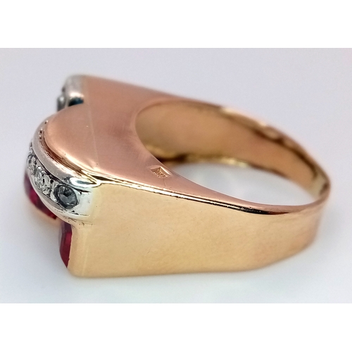 48 - An 18K Gold, Ruby and Diamond Ring. Princess and round cut stones in a mirrored form. 0.40ctw diamon... 