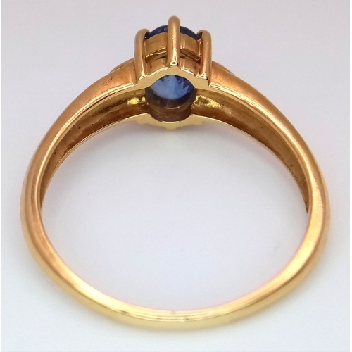 123 - An 18K Yellow Gold, Sapphire and Diamond Ring. Size U. 4.7g total weight.