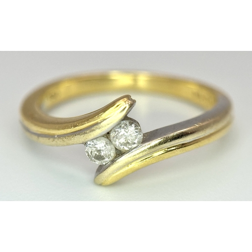 128 - An 18k yellow gold diamond crossover ring, 0.10ct diamond weight, 3.3g total weight, size K1/2. 5981... 