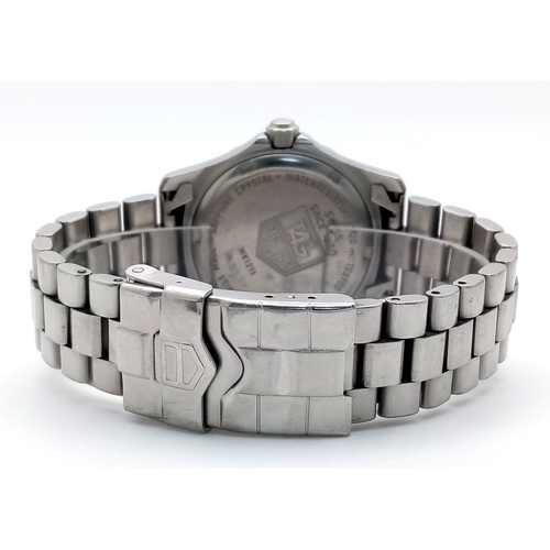 131 - A Tag Heuer Professional Quartz Unisex Watch. Model - WK1211. Stainless steel bracelet and case - 33... 