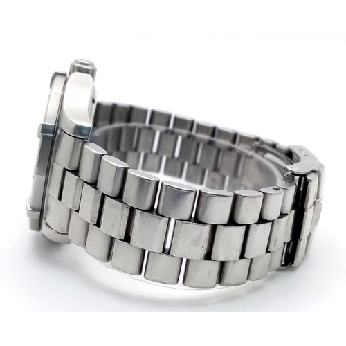 131 - A Tag Heuer Professional Quartz Unisex Watch. Model - WK1211. Stainless steel bracelet and case - 33... 