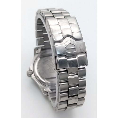131 - A Tag Heuer Professional Quartz Unisex Watch. Model - WK1211. Stainless steel bracelet and case - 33... 