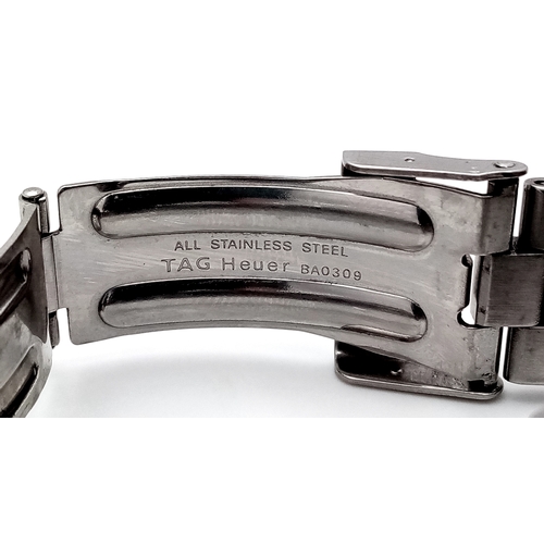131 - A Tag Heuer Professional Quartz Unisex Watch. Model - WK1211. Stainless steel bracelet and case - 33... 