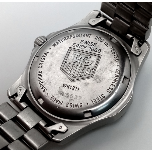 131 - A Tag Heuer Professional Quartz Unisex Watch. Model - WK1211. Stainless steel bracelet and case - 33... 