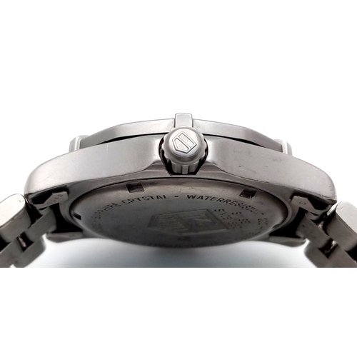 131 - A Tag Heuer Professional Quartz Unisex Watch. Model - WK1211. Stainless steel bracelet and case - 33... 