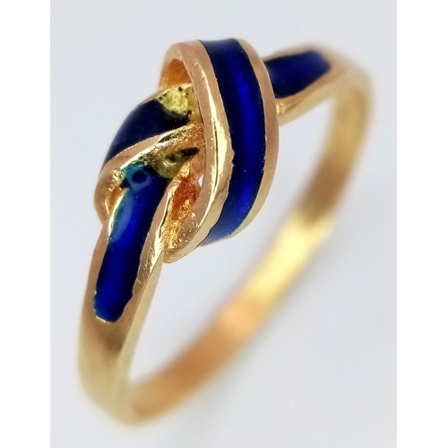 142 - An 18k yellow gold blue enamel crossover ring, 3.3g total weight, size N.1507I.
