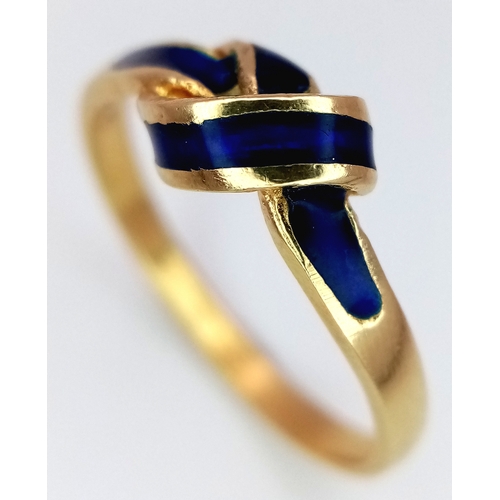 142 - An 18k yellow gold blue enamel crossover ring, 3.3g total weight, size N.1507I.