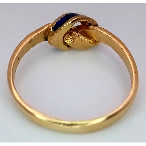 142 - An 18k yellow gold blue enamel crossover ring, 3.3g total weight, size N.1507I.