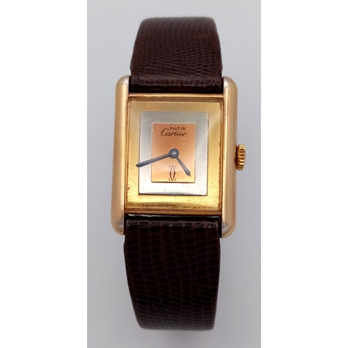 145 - A Cartier Vintage, Gilded 925 Silver Ladies Tank Watch. Model - 166320. Brown leather strap. Tank ca... 