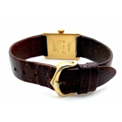 145 - A Cartier Vintage, Gilded 925 Silver Ladies Tank Watch. Model - 166320. Brown leather strap. Tank ca... 